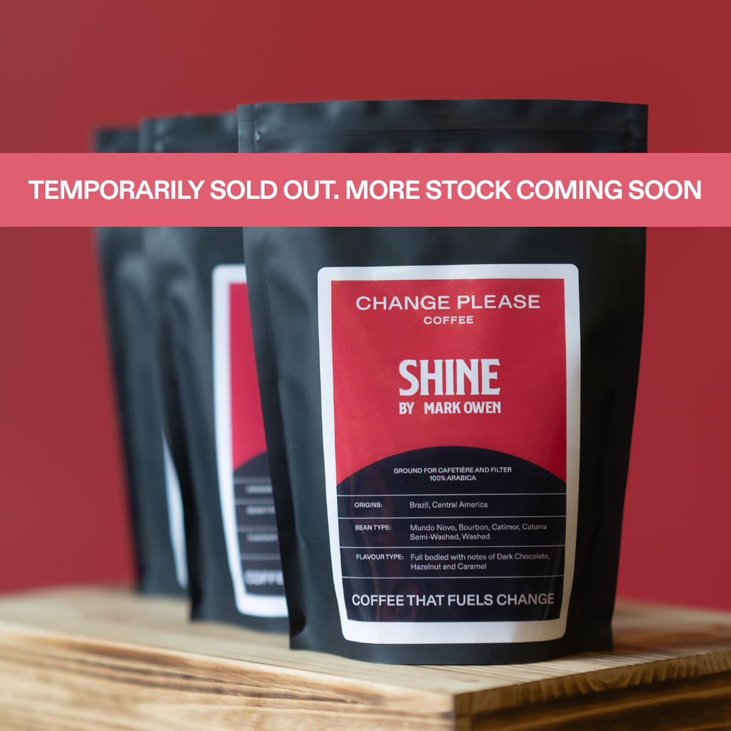 Bags of Shine by Mark Owen coffee in a semi-washed processing method, with dark chocolate, hazelnut and caramel notes, indicating the product is temporarily sold out but more stock is coming soon.